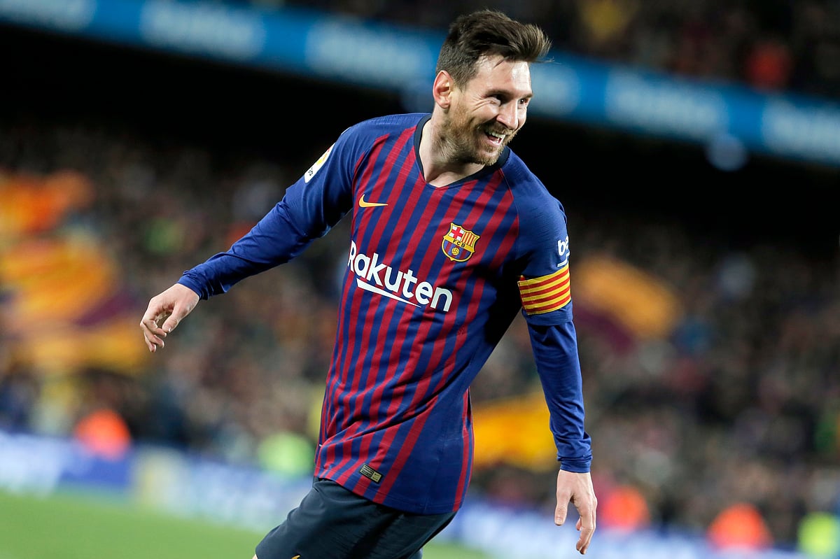 Barcelona's Argentinian forward Lionel Messi celebrates his goal during the Spanish league football match between FC Barcelona and Club Atletico de Madrid at the Camp Nou stadium in Barcelona on 6 April, 2019. Photo: AFP