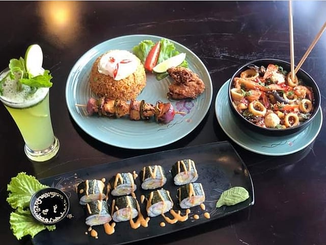 Mixed oriental meal with a minty drink. Photo: Collected