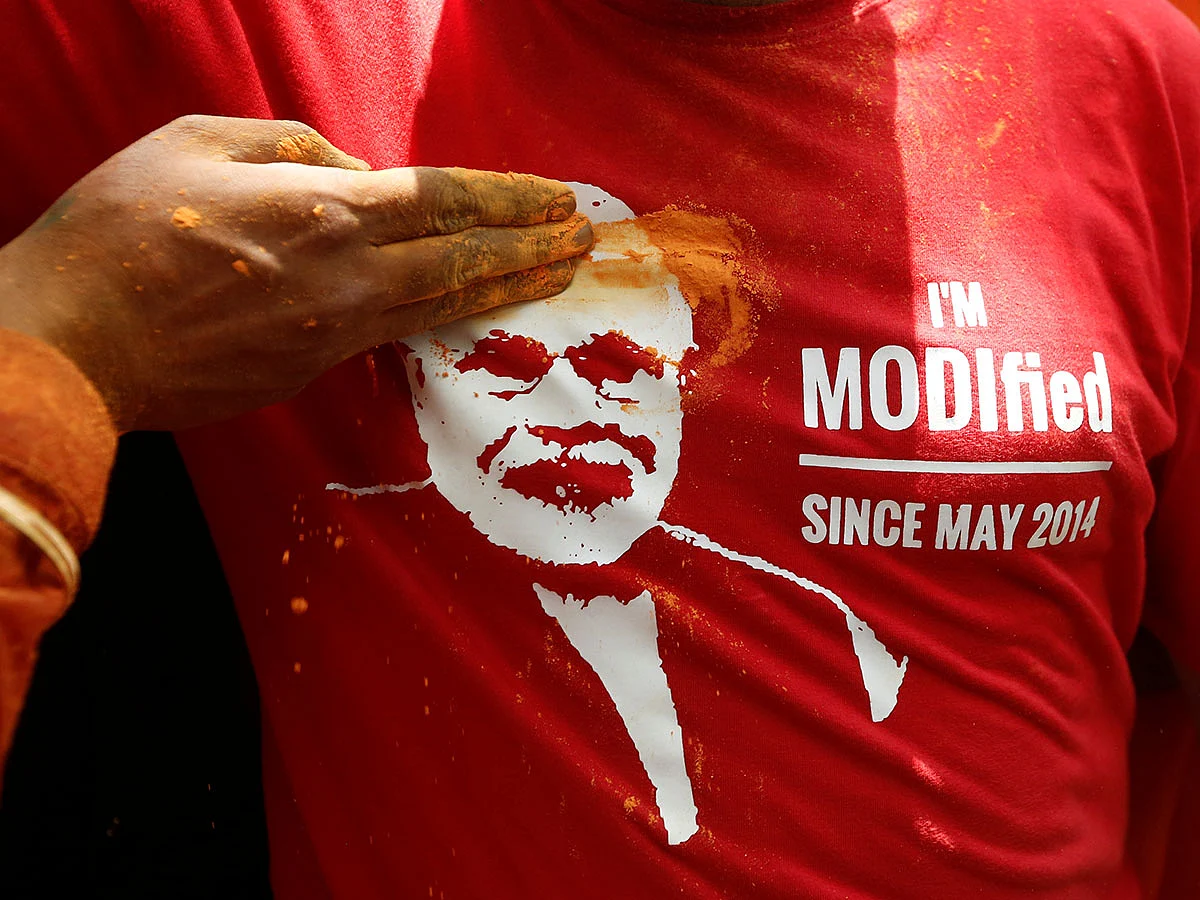 BJP supporters celebrate after learning the initial election results outside the party headquarters in New Delhi, India, on 23 May 2019. Reuters