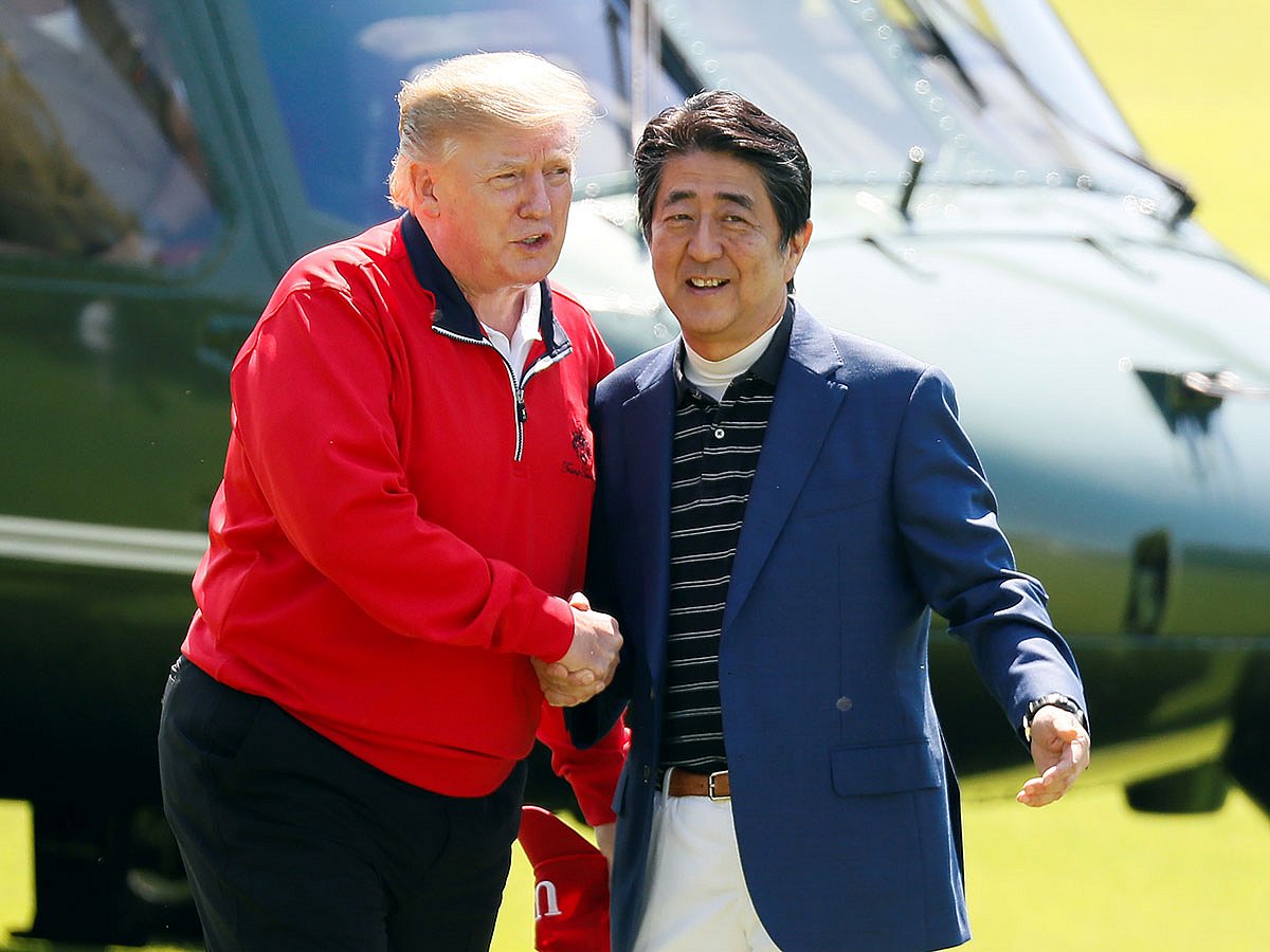 US president Donald Trump is welcomed by Japanese prime minister Shinzo Abe as he arrives on a course to play golf together at Mobara Country Club in Mobara, Chiba Prefecture, east of Tokyo, Japan on 26 May. Photo: Reuters