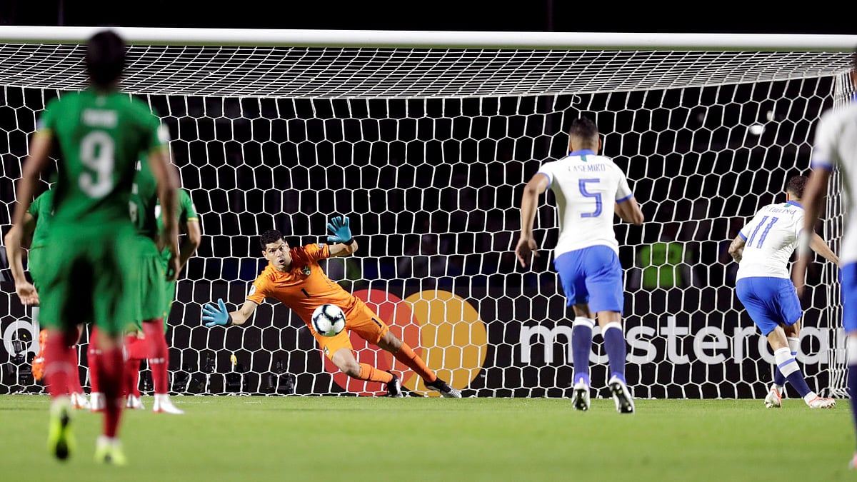 Brazil`s Philippe Coutinho scores their first goal from the penalty spot in the opening match of Copa America against Bolivia at Morumbi Stadium, Sao Paulo, Brazil on 14 June 2019. Photo: Reuters