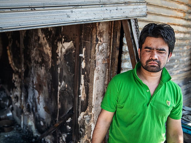 Bangladeshi Kamrul Hasan, 27, stands by his looted shop in the Johannesburg township of Alexandra on 3 September 2019 after South Africa`s financial capital was hit by a new wave of anti-foreigner violence. Photo: AFP