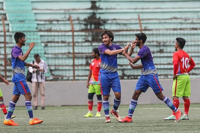 Team mates are ecstatic with Intishar’s performance.Intishar dreams of playing for the national football team. Photo : Prothom Alo