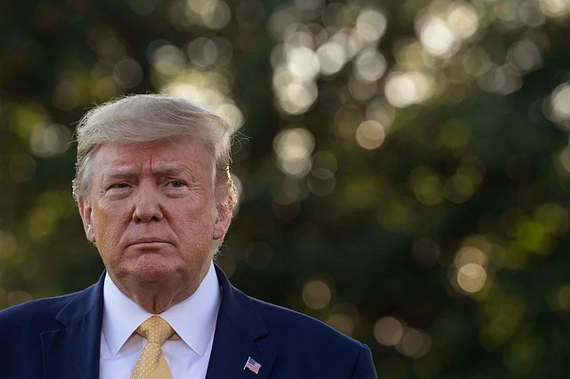 US president Donald Trump speaks to the press from the South Lawn of the White House after announcing and initial deal with China in Washington, DC, prior to departing to Lake Charles, Louisiana to hold a campaign rally on 11 October 2019. Photo: AFP