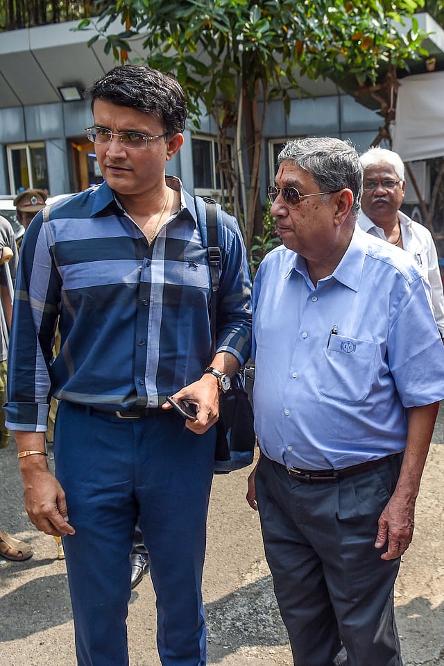 Former cricket captain Sourav Ganguly (L) and former Board of Control for Cricket in India (BCCI) president N Srinivasan arrive at the BCCI headquarters at Wankhede stadium to file nomination for the board`s elections in Mumbai on 14 October 2019. Photo: AFP