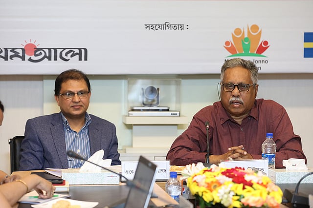 Participants pose for a photograph at a roundtable on role of rural women in climate change adaptation at Karwan Bazar’s CA Bhaban on Saturday. Photo: Syful Islam.