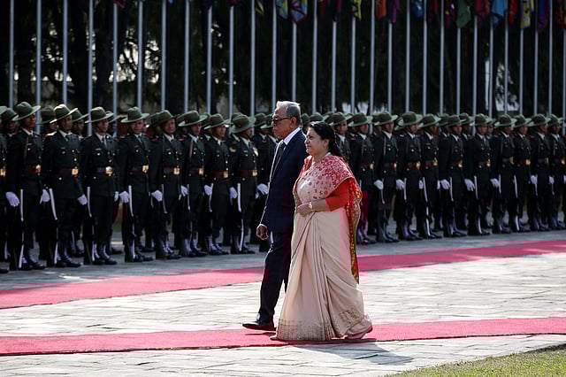 Bangladeshi president Abdul Hamid and Nepalese counterpart Bidhya Devi Bhandari inspect a joint military guard of honour at Tribhuwan International airport in Kathmandu, Nepal on 12 November 2019. Photo: Reuters