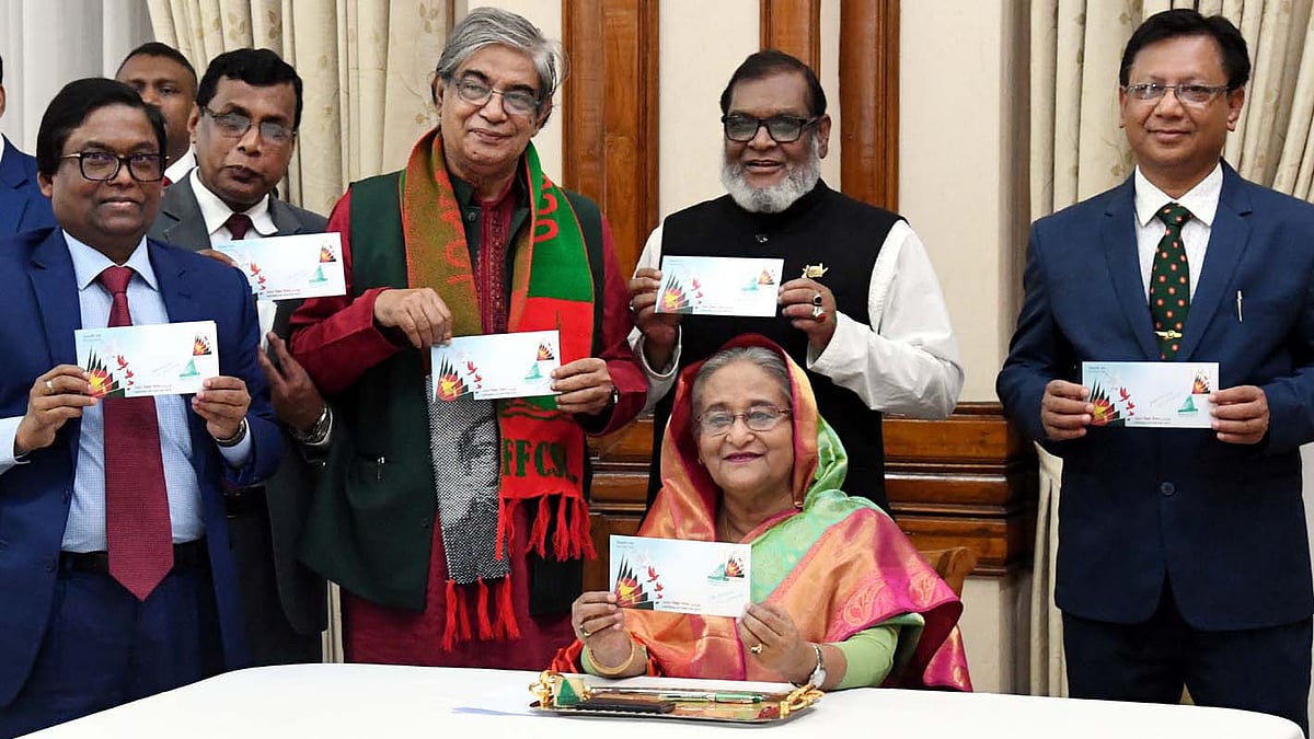 Prime minister Sheikh Hasina on Monday released a commemorative postage stamp, a first-day cover and a data card, marking the 49th Victory Day. Photo: PID