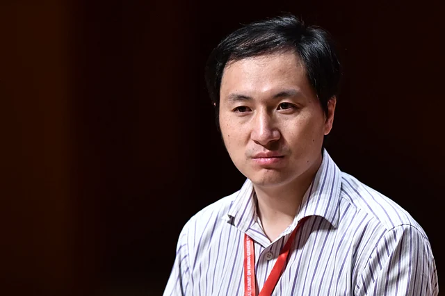 In this file photo taken on 28 November 2018 Chinese scientist He Jiankui reacts during a panel discussion after his speech at the Second International Summit on Human Genome Editing in Hong Kong. Photo: AFP