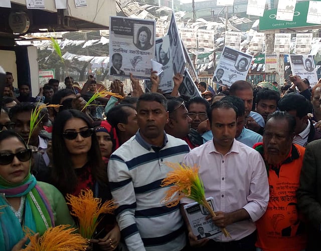 Dhaka North City Corporation mayor candidate Tabith Awal organises campaigns at Taltola area of Mirpur in Dhaka on 18 January. Photo: Selim Zahid