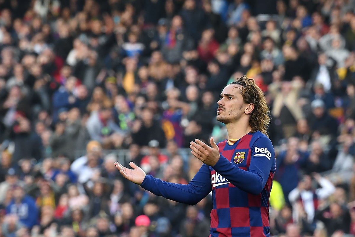 Barcelona`s French forward Antoine Griezmann reacts after missing a goal opportunity during the Spanish league football match between FC Barcelona and Getafe CF at the Camp Nou stadium in Barcelona on 15 February, 2020. Photo: AFP