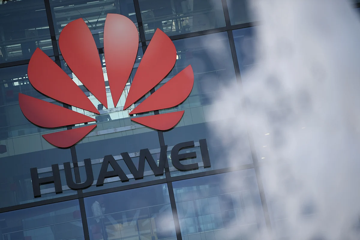 In this file photo taken on 28 January the logo of Chinese company Huawei is pictureedat their main UK offices in Reading, west of London