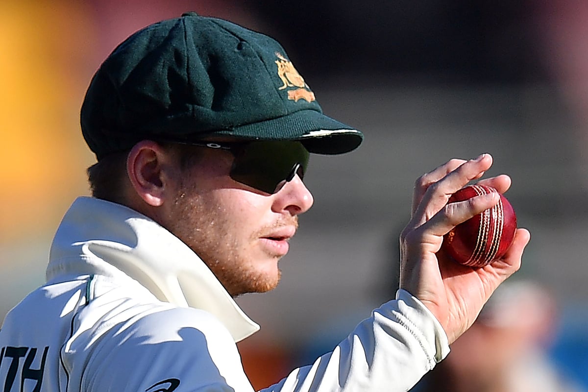 In this file photo taken on November 23, 2019, Australia's Steve Smith holds the ball on day three of the first Test cricket match between Pakistan and Australia at the Gabba in Brisbane.