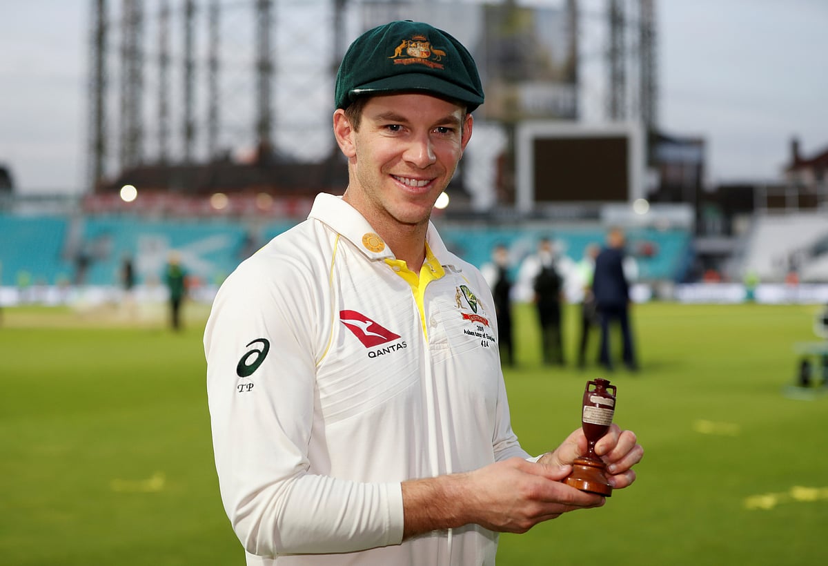Australia's Tim Paine celebrates with the Ashes urn after drawing the series to retain the Ashes at Kia Oval, London, Britain on 15 September 2019