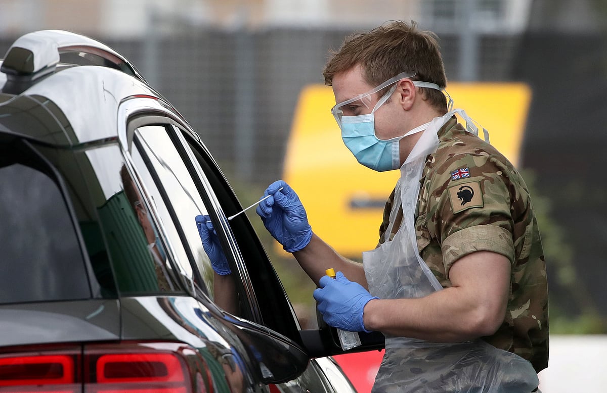 A soldier from 2 Scots Royal Regiment of Scotland assists at a COVID-19 testing centre amid the coronavirus disease outbreak, at Glasgow Airport, in Glasgow, Scotland 29 April 2020.