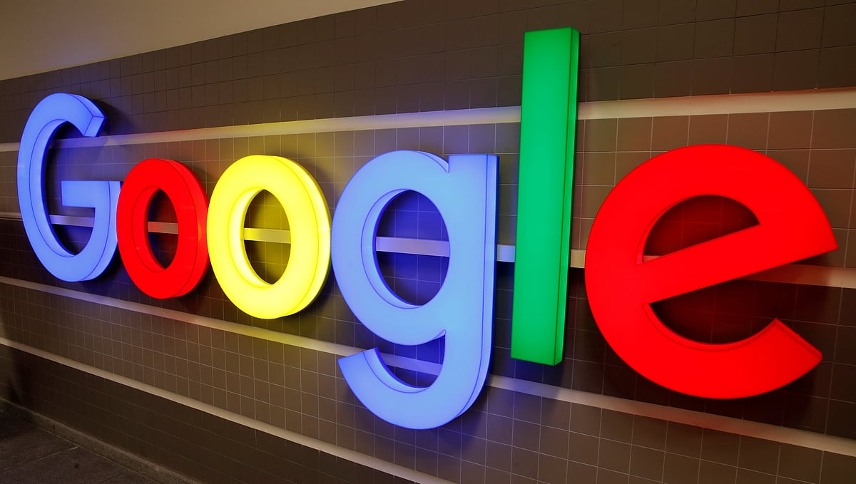 An illuminated Google logo is seen inside an office building in Zurich, Switzerland on 5 December 2018.