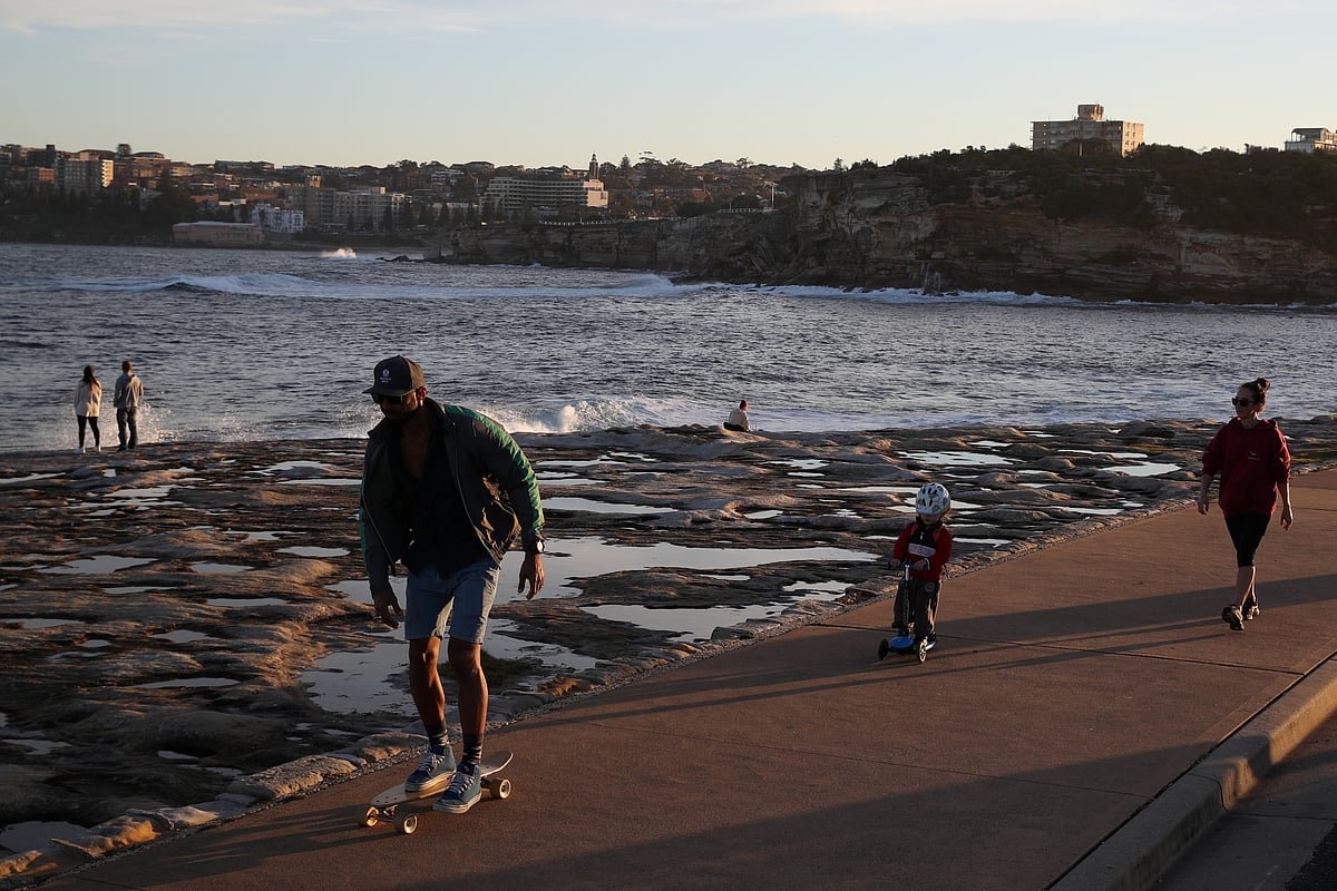 Families enjoy a clear evening on the coast amidst the easing of restrictions implemented to curb the spread of the coronavirus disease (COVID-19) in Sydney, Australia, on 6 May 2020