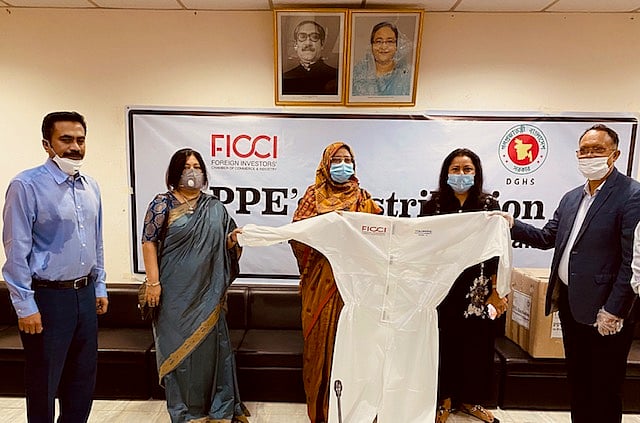 FICCI president Rupali Haque Chowdhury handed over the PPE to DGHS acting director general Nasima Sultana at a simple ceremony.