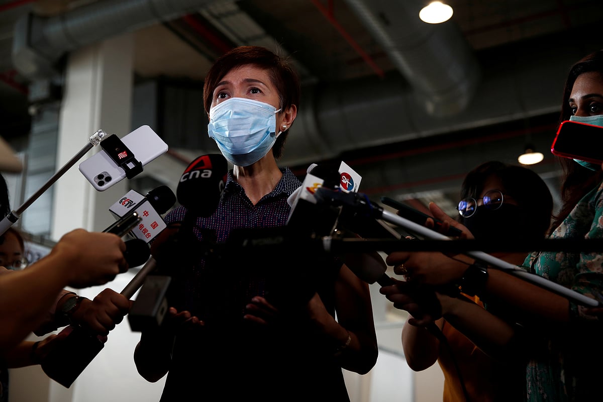 Singapore's manpower ministerJosephine Teo speaks to the media during a tour of a new medical facility set up for testing migrant workers residing in dormitories for the coronavirus disease (COVID-19), in Singapore, 10 May 2020.