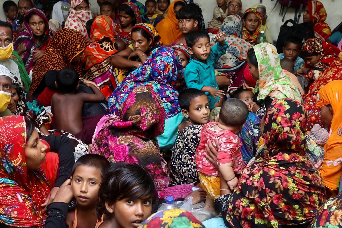 People gather at a Cyclone Centre for protection before the cyclone Amphan makes its landfall in Gabura outskirts of Satkhira district, Bangladesh 20 May 2020.