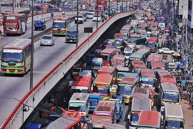 Buses clog a road at Jatrabari, Dhaka when public transport services resumed after a two-month hiatus amid coronavirus outbreak. 2 June 2020.