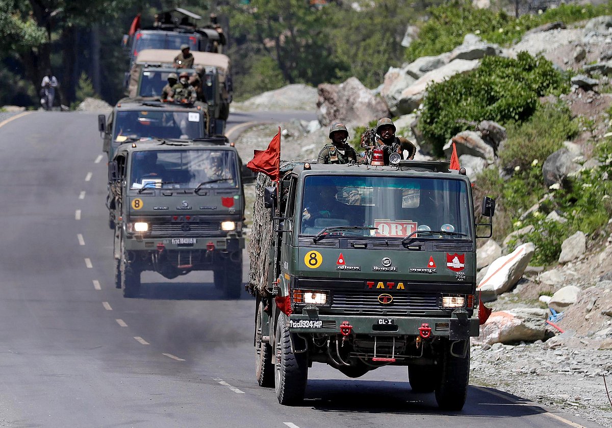 An Indian Army convoy moves along a highway leading to Ladakh, at Gagangeer in Kashmir's Ganderbal district 18 June, 2020.