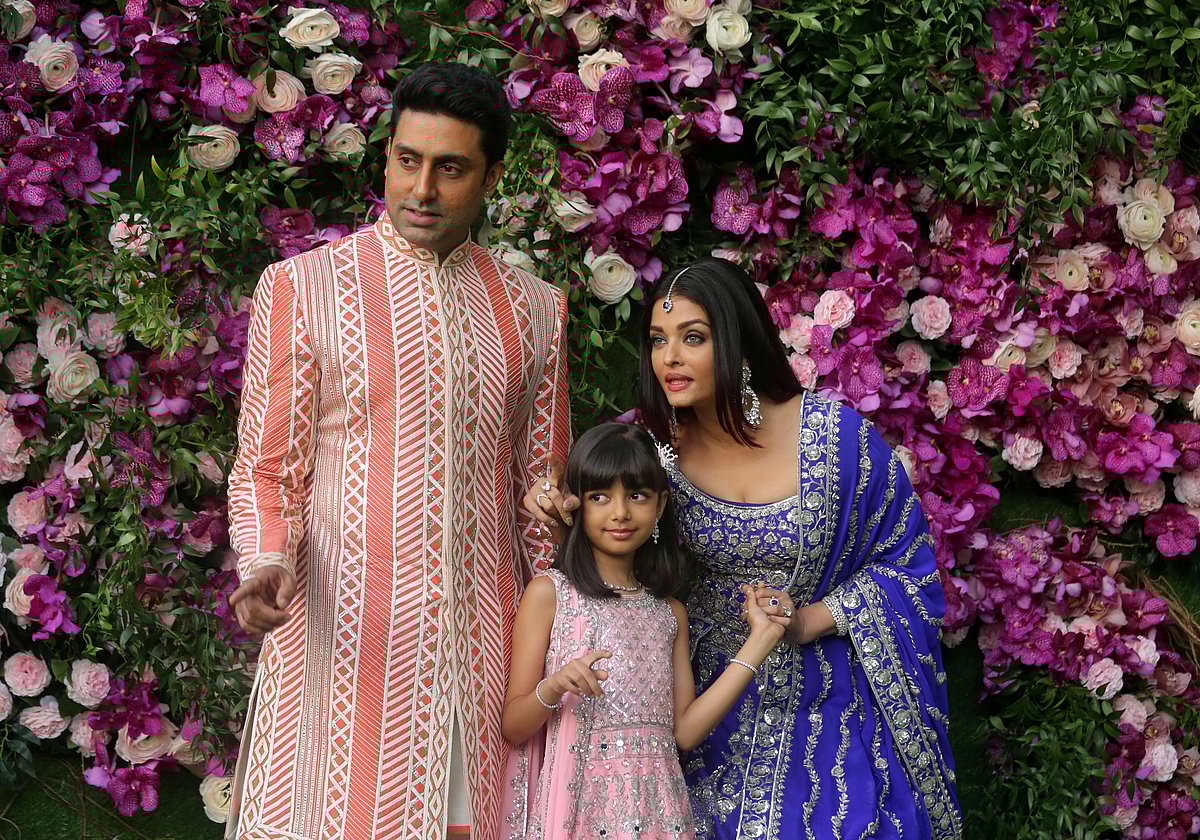 Indian film actor Abhishek Bachchan, his wife Aishwarya Rai and their daughter Aaradhya in a 2019 photograph taken at the wedding of Akash Ambani, the son of Reliance Industries chairman Mukesh Ambani, in Mumbai, India. Picture taken on 9 March 2019.