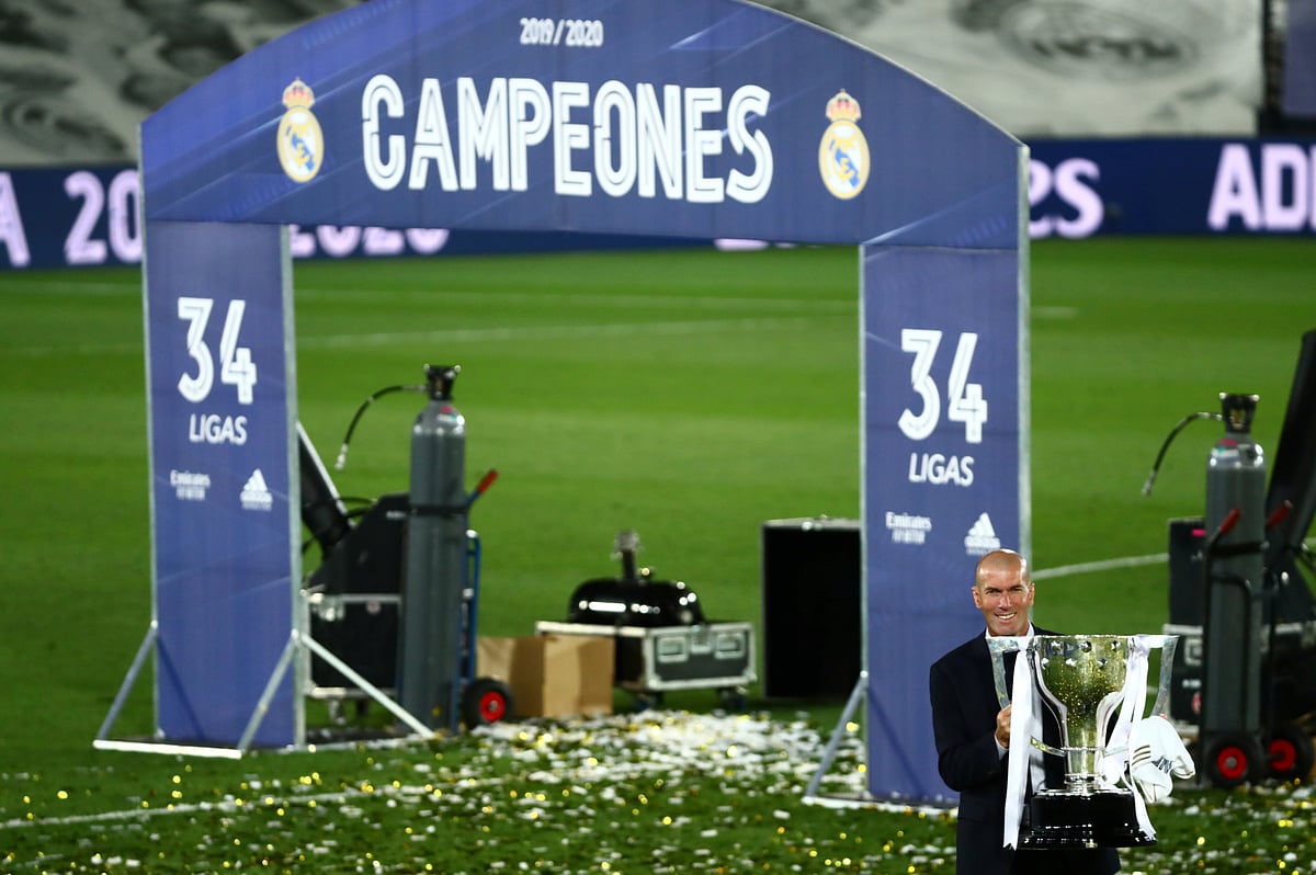 Real Madrid coach Zinedine Zidane celebrates with the trophy after winning La Liga  title at Alfredo Di Stefano Stadium, Madrid, Spain on 16 July 2020