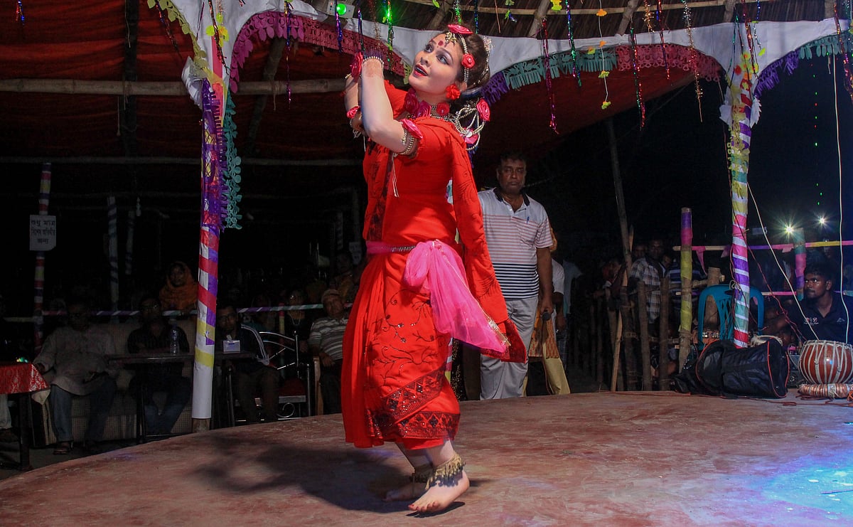 A girl dances at the Rush Mela