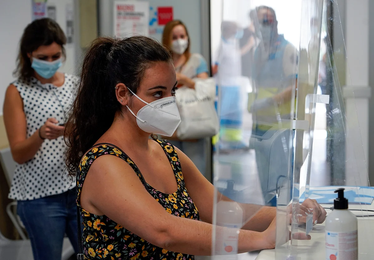 A woman waits for PCR testing at a primary healthcare centre during the coronavirus disease ( COVID-19) pandemic in Madrid, Spain, 17 August 2020.