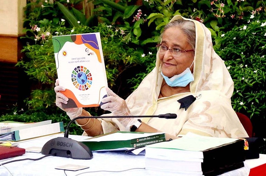 Prime minister Sheikh Hasina unveils a book on Bangladesh advancement report 2020 while chairing the ECNEC meeting from her official Gonobhaban residence through video conferencing on 25 August 2020