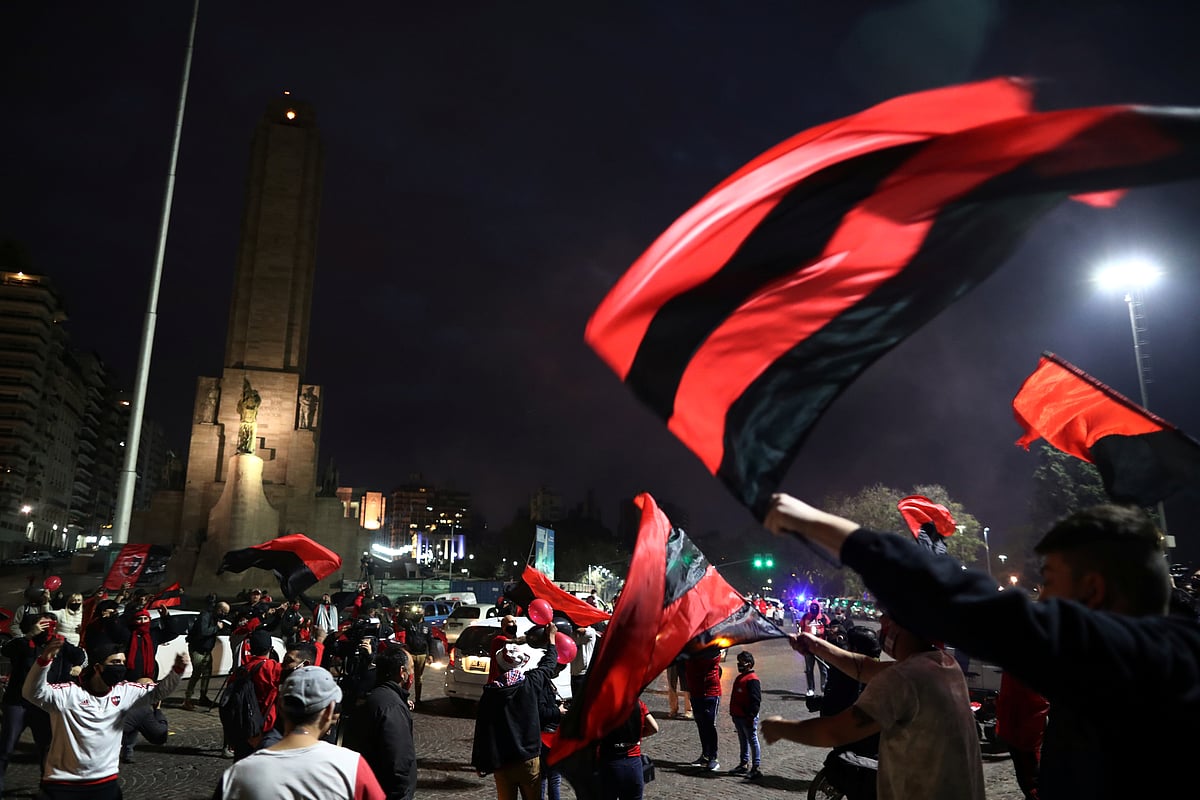 Newell's Old Boys fans march to express their hopes for Lionel Messi to continue his career in Rosario