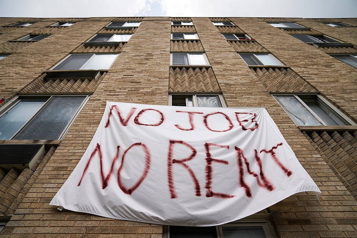 Residents of Meridian Heights apartments in Northwest Washington display a painted bedsheet protesting for the cancelation of rent due to the loss of jobs during the coronavirus disease (COVID-19) pandemic in Washington, DC, US, 20 August 2020.