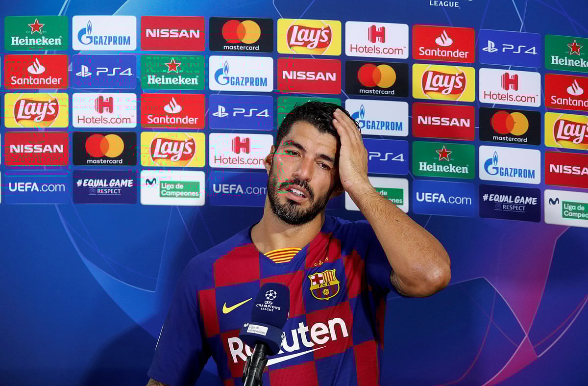 Barcelona's Luis Suarez speaks to the media after the match, as play resumes behind closed doors following the outbreak of the coronavirus disease (COVID-19)