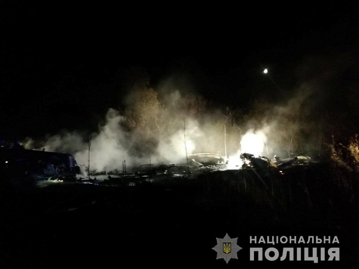 Wreckages of the Ukrainian military Antonov An-26 plane are seen at its crash site outside of Chuhuiv town, Ukraine on 25 September 2020