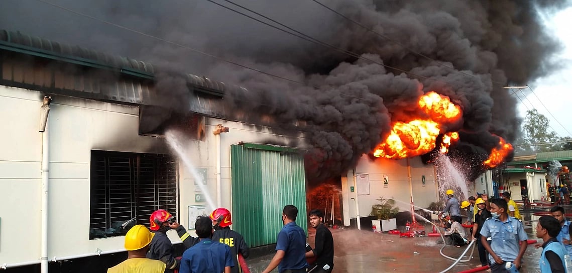 Fire fighters were trying to douse the fire which ensued in FB Footwear Limited in Kaliakair upazila’s Ulusara area on Saturday.