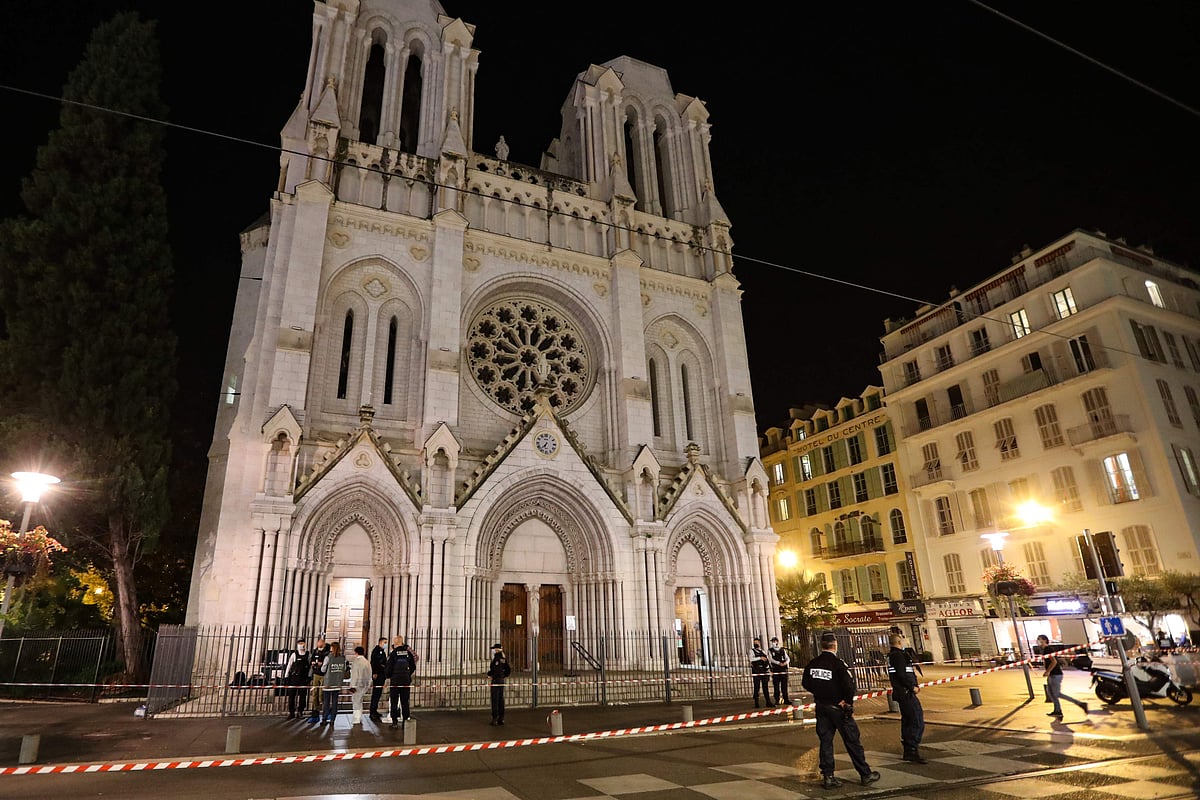 Police block the access to the Notre-Dame de l'Assomption Basilica in Nice on 29 October 2020 after a knife-wielding man kills three people in the church, slitting the throat of at least one of them, in what officials are treating as the latest jihadist attack to rock the country