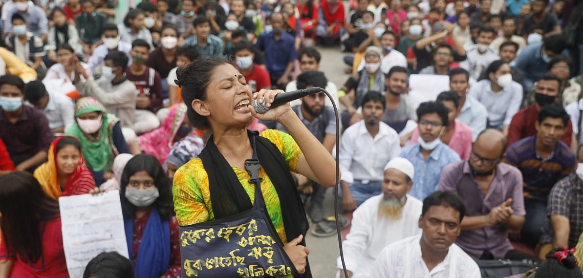 An activist chants slogan at a rally demanding punishment over the rape incidents. General students, activists and supporters of left-leaning student bodies organised the rally at Shahbagh on 9 October.