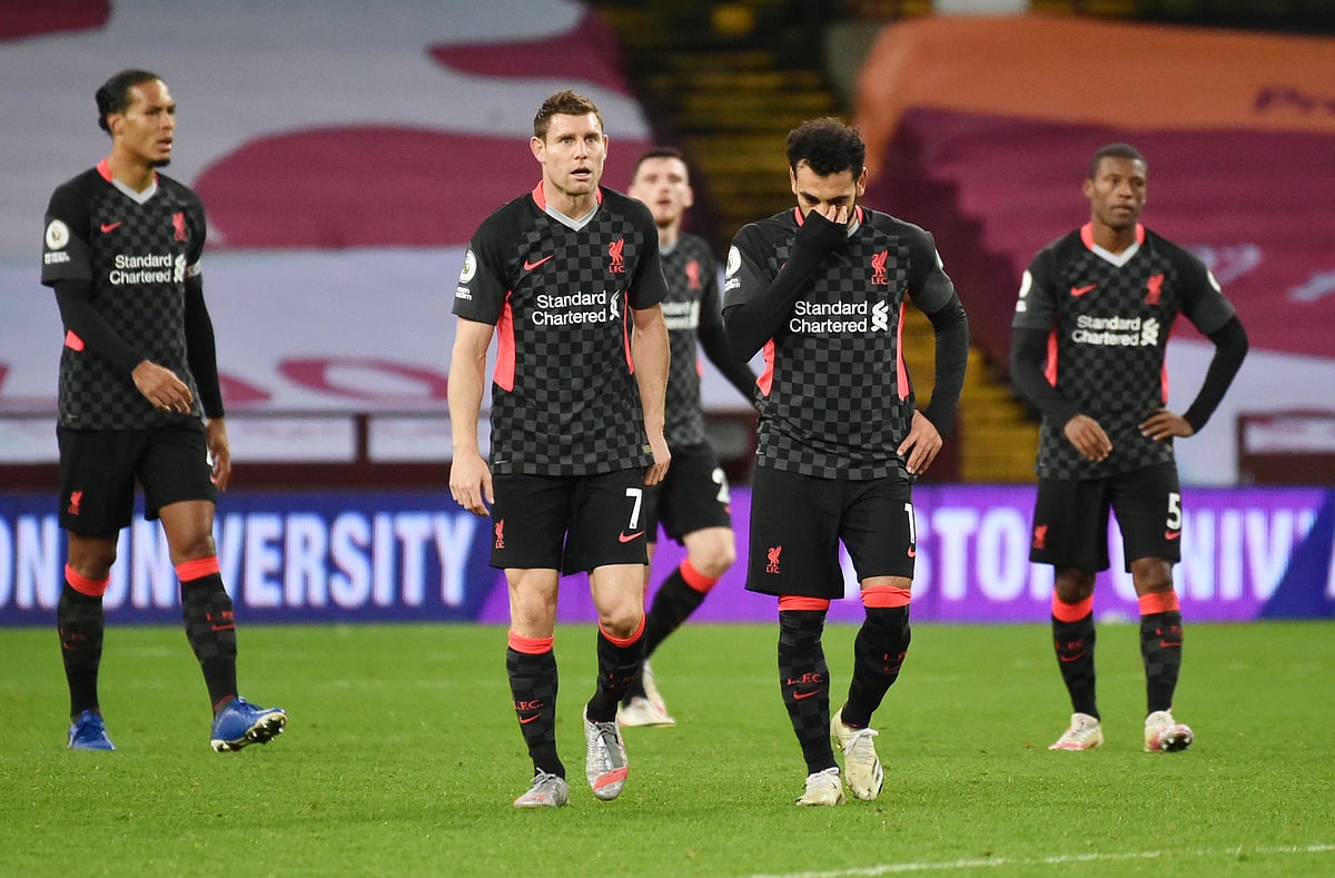 Liverpool's Mohamed Salah, James Milner and teammates look dejected after conceding their seventh goal against  Aston Villa at Villa Park, Birmingham, Britain on 4 October, 2020.