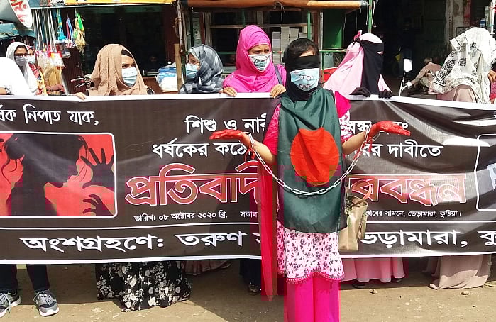Students hold human chain protesting against incidents of rape. This photo is taken at Bheramara in Kusthia on 8 October
