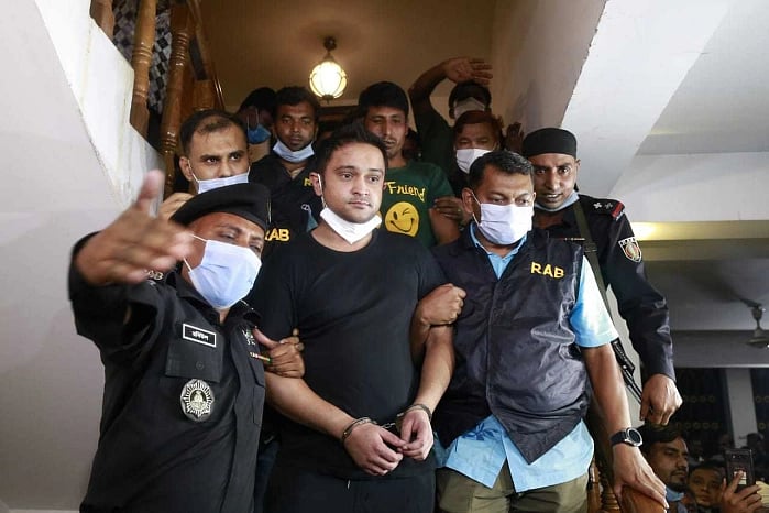 RAB taking away Irfan Salim after arrest