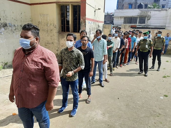 Voters' queue at Matuail Ideal High School centre