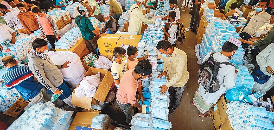 The Babubazar wholesale mask market bustles with sales as coronavirus cases increase in the country