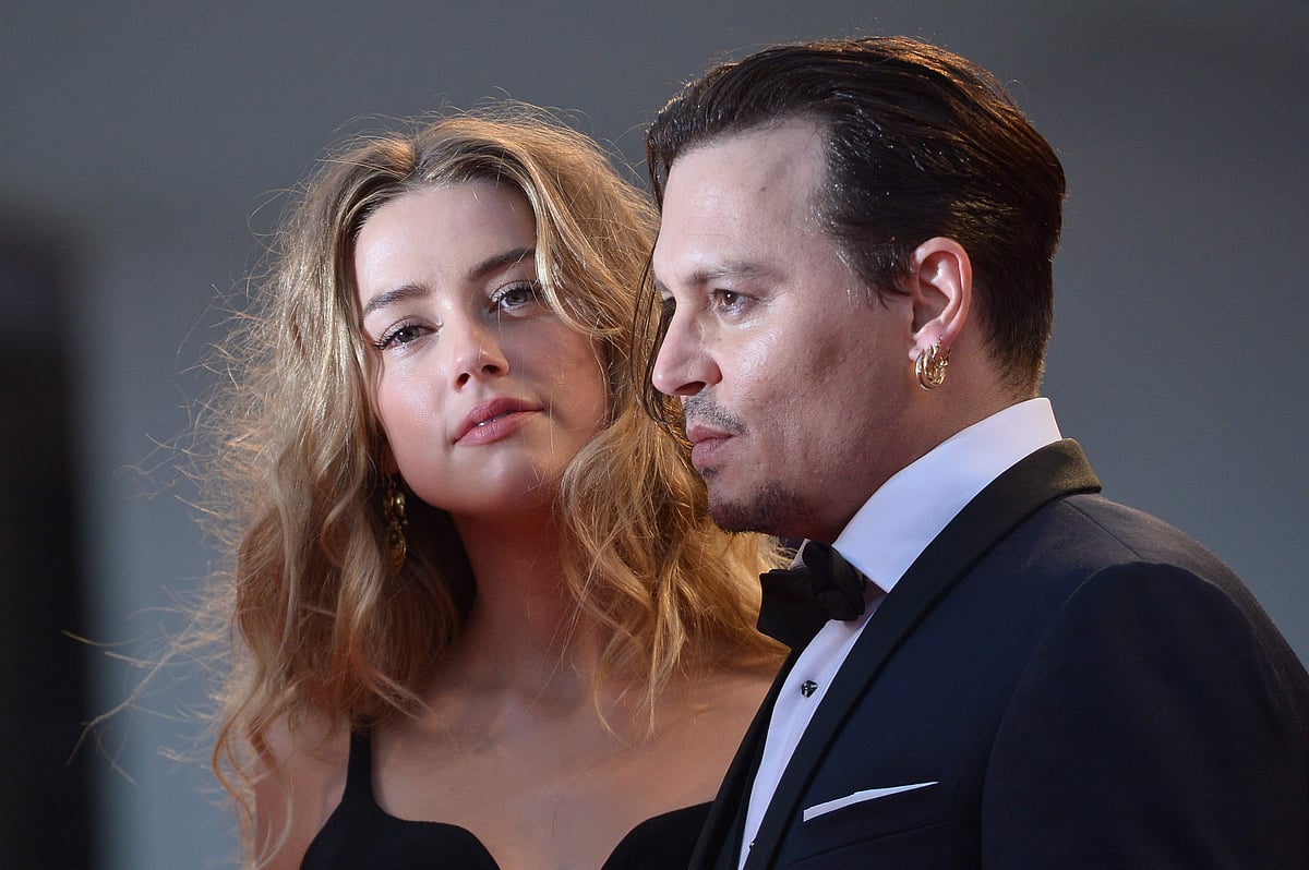 In this AFP file photo taken on 4 September, 2015 US actor Johnny Depp and his former wife US actress Amber Heard