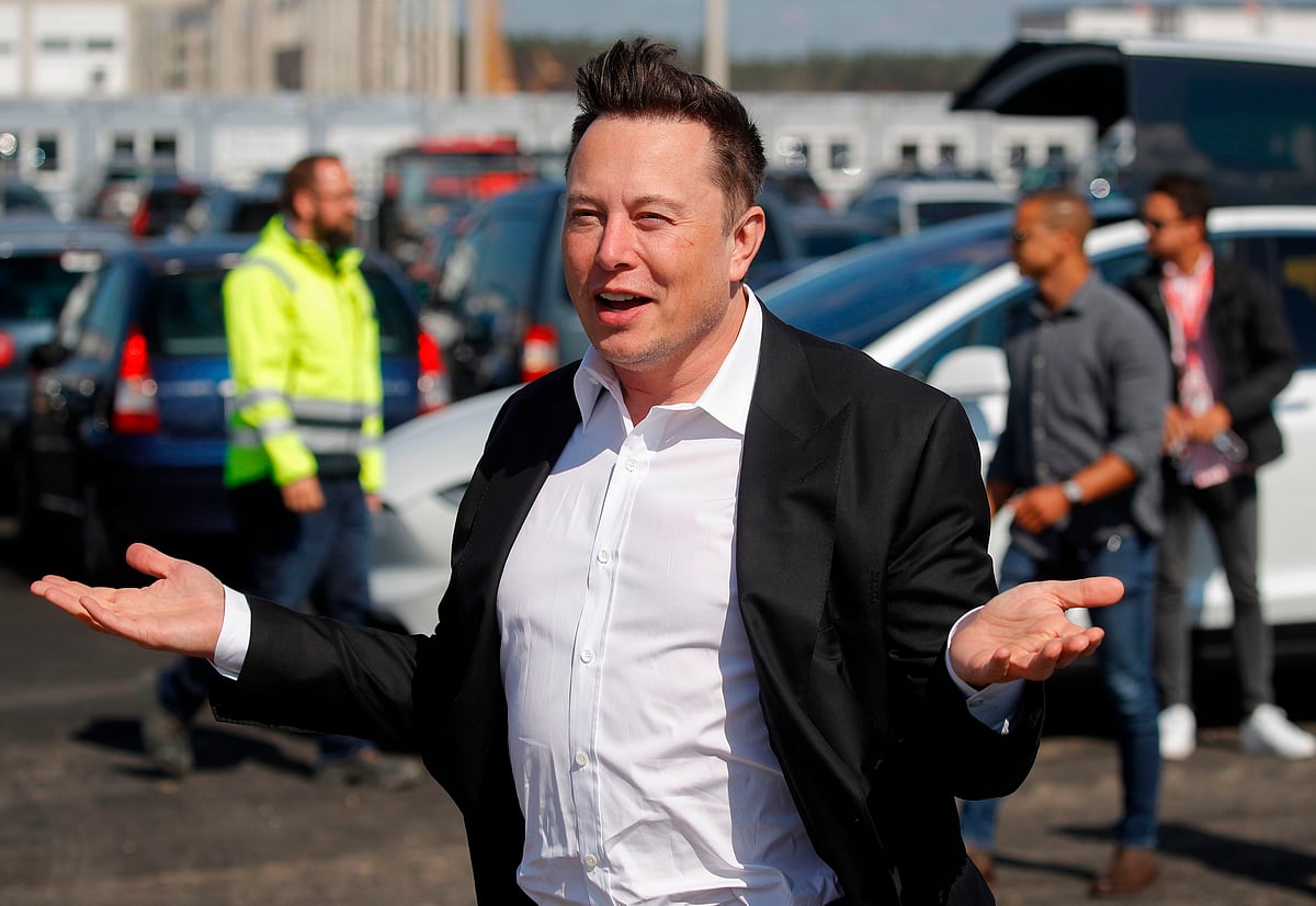 In this file photo taken on 3 September 2020, Tesla CEO Elon Musk arrives to visit the construction site of the future US electric car giant Tesla in Gruenheide near Berlin