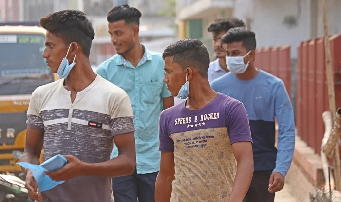 People are lax of wearing face masks although COVID-19 cases are increasing in the country. This picture was taken near Shaheed Minar area in Sylhet on 23 November