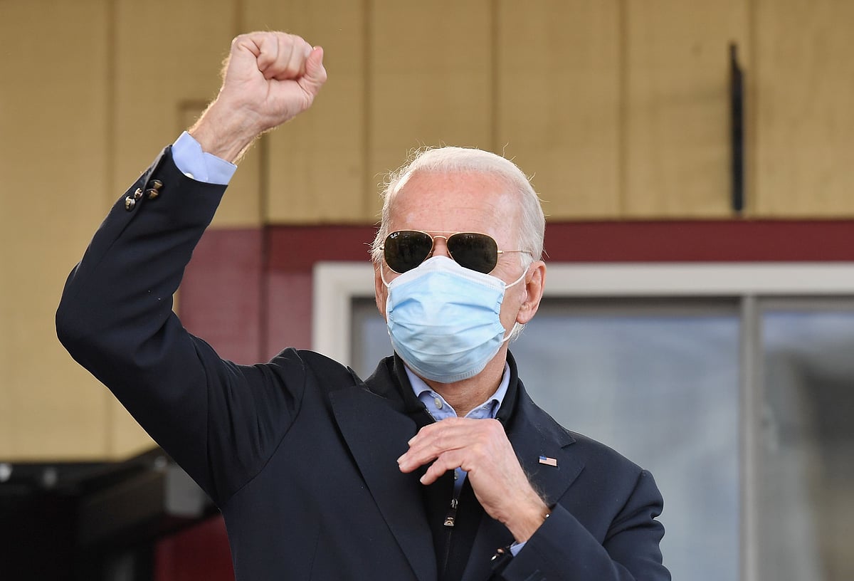 In this file photo Democratic presidential candidate Joe Biden speaks to supporters in Philadelphia, Pennsylvania, on 3 November 2020
