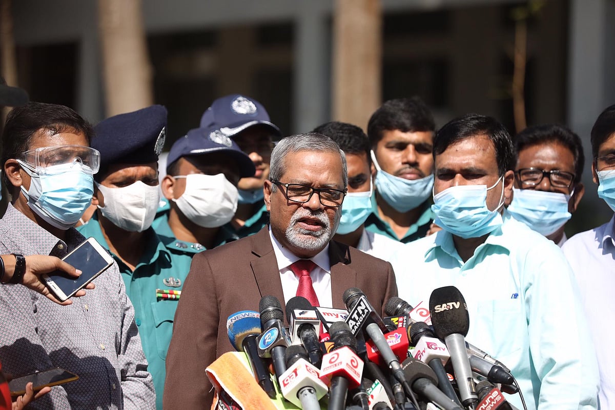 CEC Nurul Huda talks to media after casting his vote in the by-elections to Dhaka-18 constituency on 12 November 2020