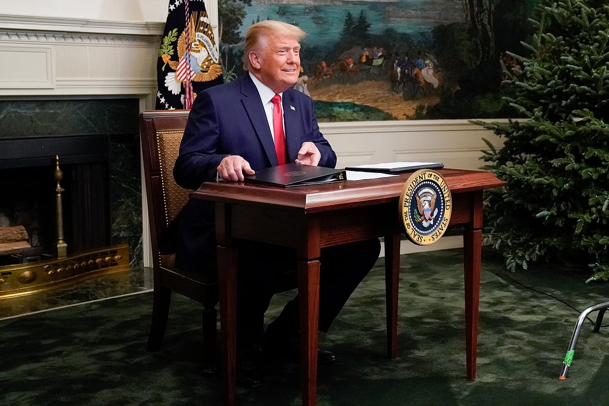 US president Donald Trump arrives to a Thanksgiving video teleconference with members of the military forces at the White House in Washington, US, 26 November, 2020