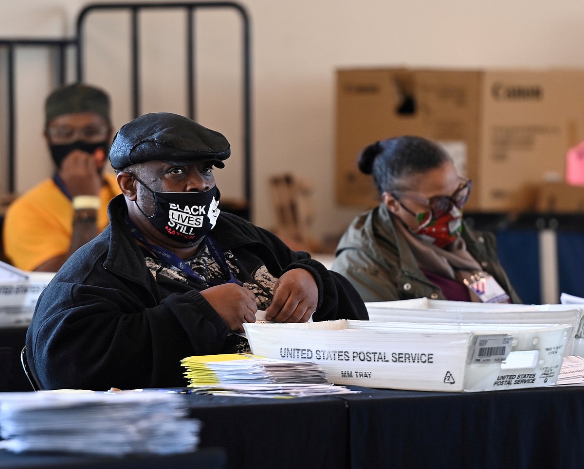 Employees of the Fulton County Board of Registration and Elections process ballots in Atlanta, Georgia 4 November , 2020